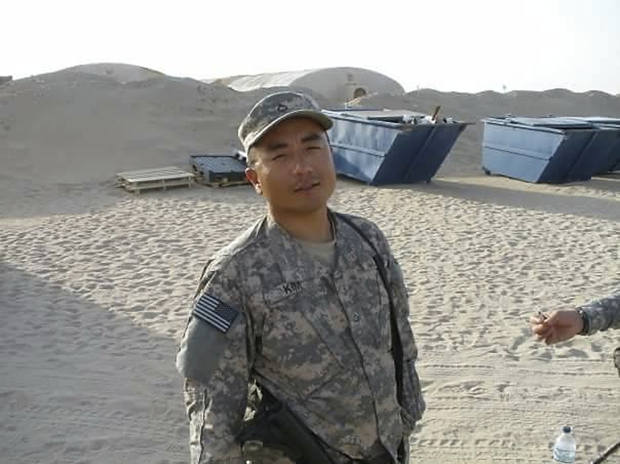 Chong Kim poses for a photo in National Guard fatigues. An immigrant rights group is asking the U.S. Department of Homeland Security to release an Iraq War veteran who has been detained for more than three months while waiting to learn whether he’ll be deported.