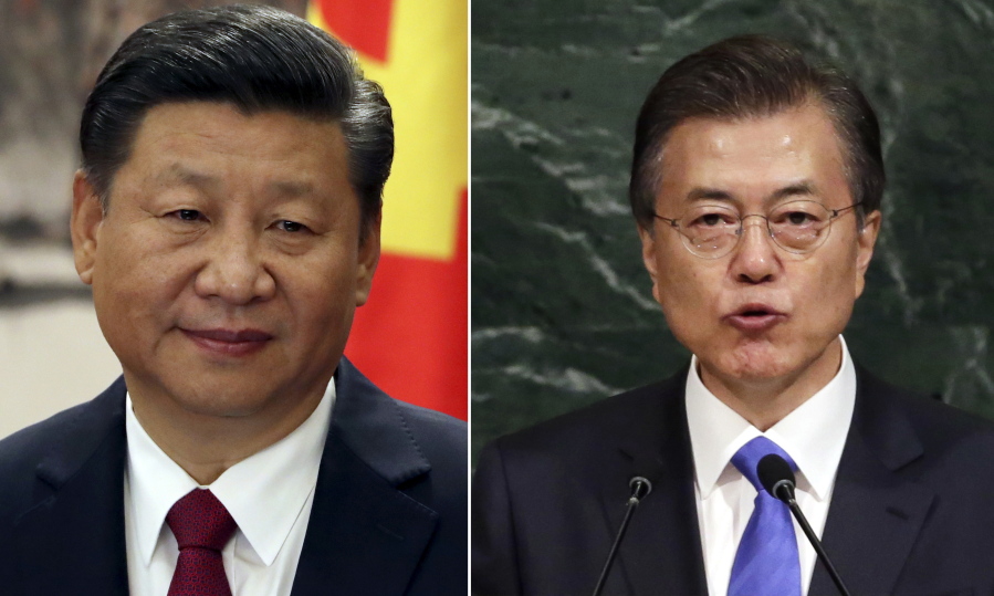 Chinese President Xi Jinping, left, in Beijing and South Korean President Moon Jae-in at U.N. headquarters. South Korean senior presidential official told a televised briefing Tuesday, Oct. 31, 2017 that President Moon and Xi will talk on the sidelines of an annual regional forum in Vietnam next week.
