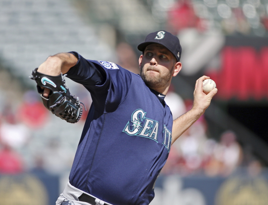 Seattle Mariners starter James Paxton pitches to the Los Angeles Angels in the first inning of a baseball game in Anaheim, Calif., Sunday, Oct. 1, 2017.