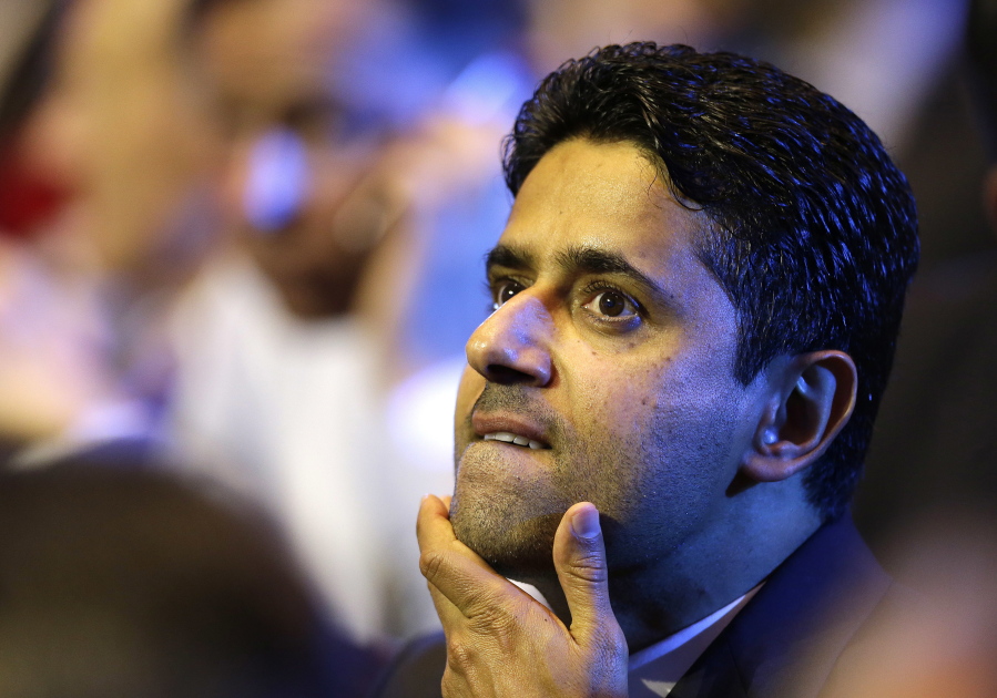 President of Paris Saint-Germain soccer club, Nasser Al-Khelaifi, gestures during the UEFA Champions League draw at the Grimaldi Forum, in Monaco. Al-Khelaifi was questioned Wednesday, Oct. 25, 2017, by Swiss investigators who allege he bribed a top FIFA official in a World Cup broadcasting rights deal. He met with Switzerland’s federal prosecutors, two weeks after they revealed criminal proceedings against him. Al-Khelaifi is also Qatari soccer and television executive.