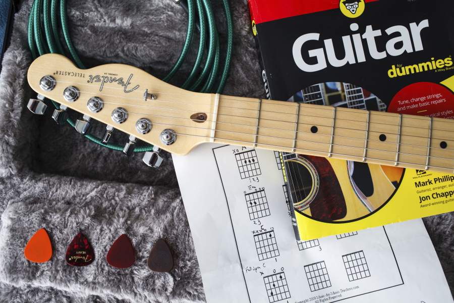 There are multitude of resources for learning to play the guitar, from phone apps and videos to books and teachers.