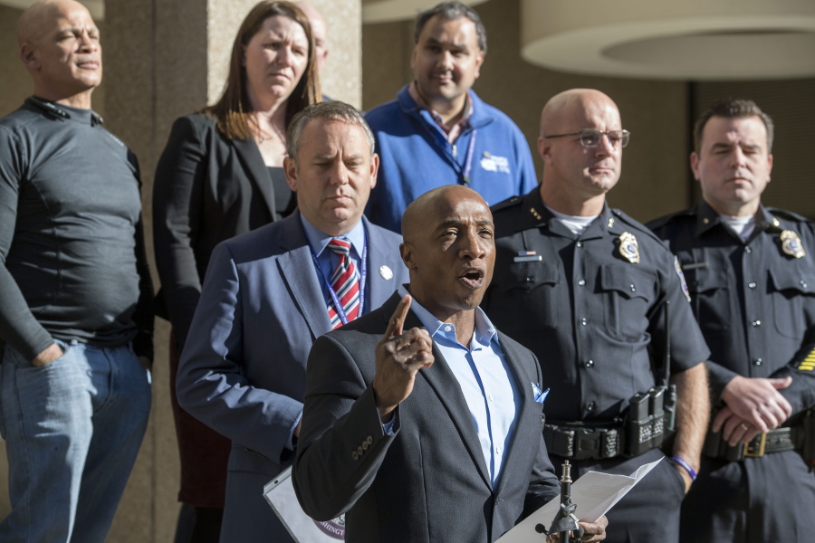 Phil Tyler, former president of the NAACP’s Spokane chapter, urges the community to push back against hate crimes during a press conference Wednesday, Oct. 11, 2017, addressing the arrest of two men involved in a random racially motivated attack Sunday evening.