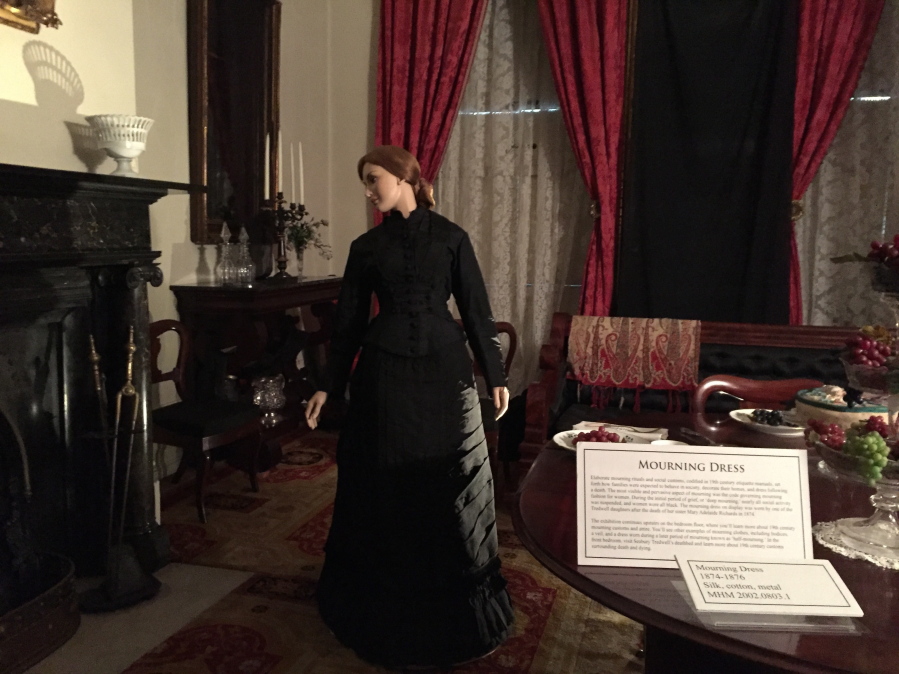 A figure in a mourning dress in the Merchant’s House Museum in New York. The 1832 house was home to the Tredwell family for nearly 100 years, and seven family members died there. Beth J.
