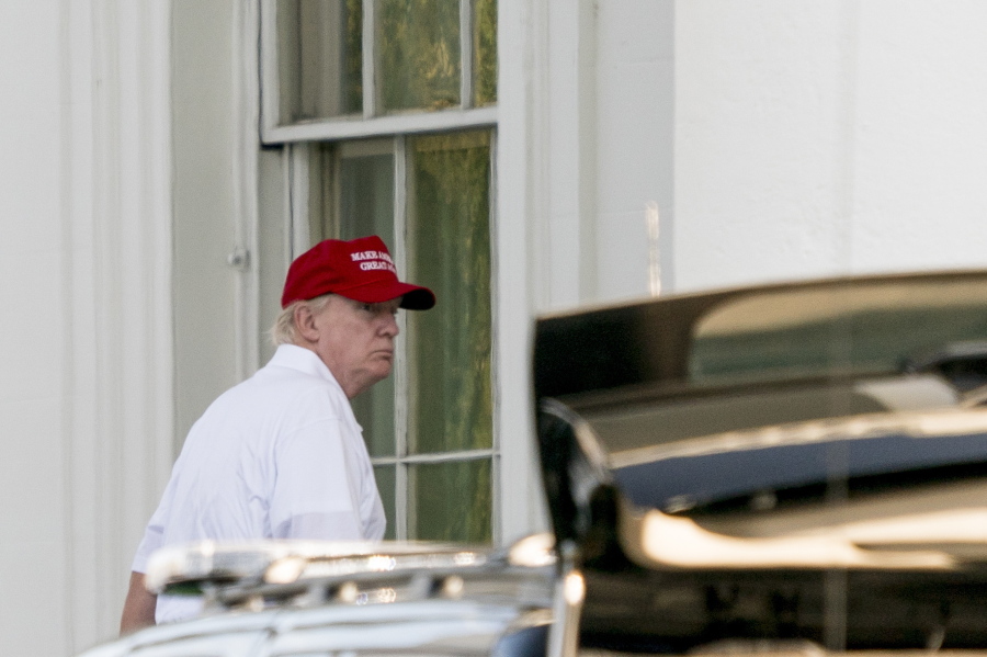 President Donald Trump arrives at the North Lawn of the White House in Washington on Sunday after playing golf at Trump National Golf Club in Sterling, Va.