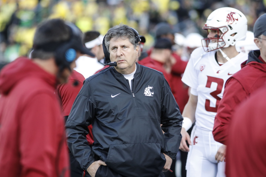 Washington State head coach Mike Leach works the sidelines against Oregon in an NCAA college football game Saturday, Oct. 7, 2017 in Eugene, Ore.