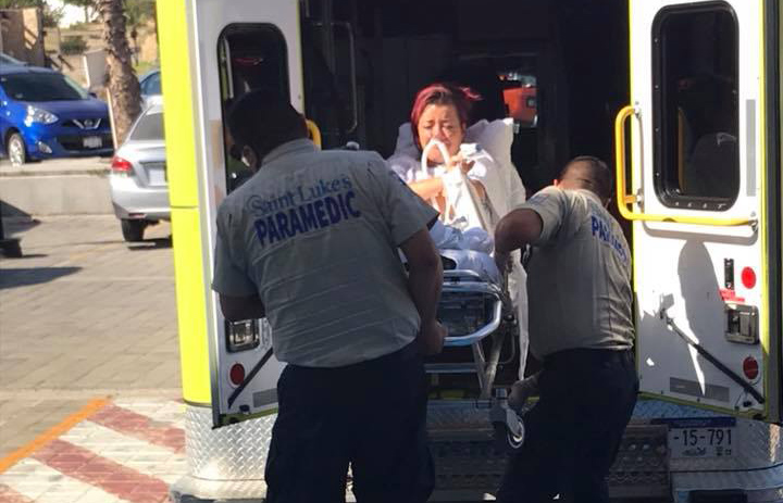 Spokane's Brandi Gallagher, 34, is loaded into an ambulance Tuesday in Cabo San Lucas, Mexico, to be transferred to a different hospital. Gallagher's family says she was held hostage at Saint Luke's Medical Center, and they were ordered to pay $55,000 to secure her treatment and release.