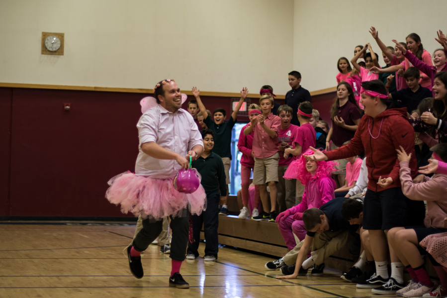 Battle Ground: Students and staff at Firm Foundation Christian School raised money for the National Breast Cancer Foundation during a pep rally and volleyball game.