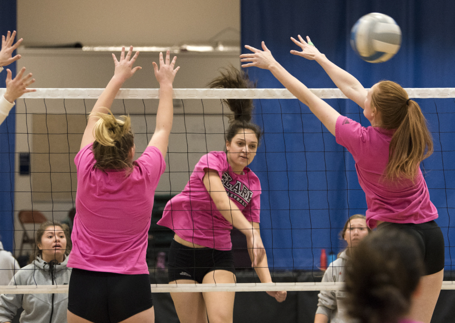 Clark College middle hitter Olivia White, a Skyview High grad, runs through drills during practice Monday at O’Connell Sports Center. The Penguins are preparing for the NWAC Championship tournament that begins Thursday at Tacoma.