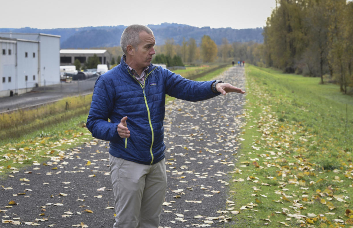 David Ripp, executive director of the Port of Camas-Washougal, points to some of the problems inspectors have identified with the levee the port maintains.