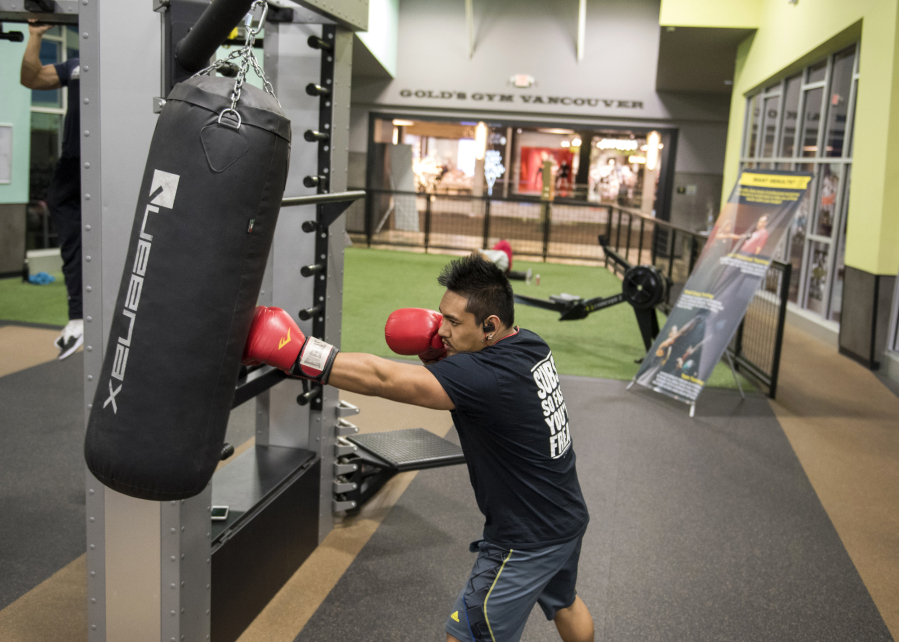 Denzel Bartolaba of Vancouver exercises at Gold’s Gym in Vancouver Mall on Monday afternoon. Gold’s Gym is one of the new service-style tenants at the mall as it shifts slowly from exclusively apparel to a more well-rounded experience.