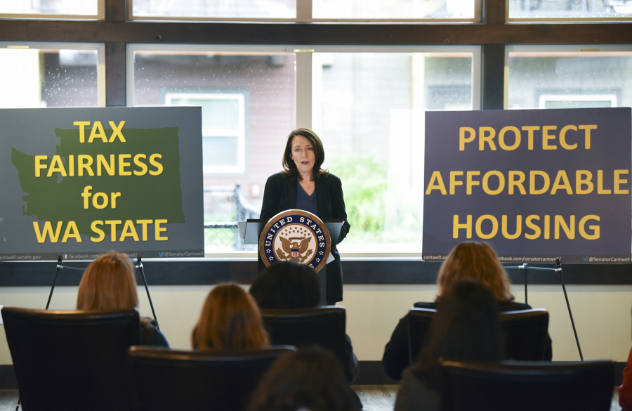 Sen. Maria Cantwell, D-Wash., speaks Tuesday about the Republican tax bill and how it would affect local affordable housing projects at the 1st Street Apartments complex in Vancouver.