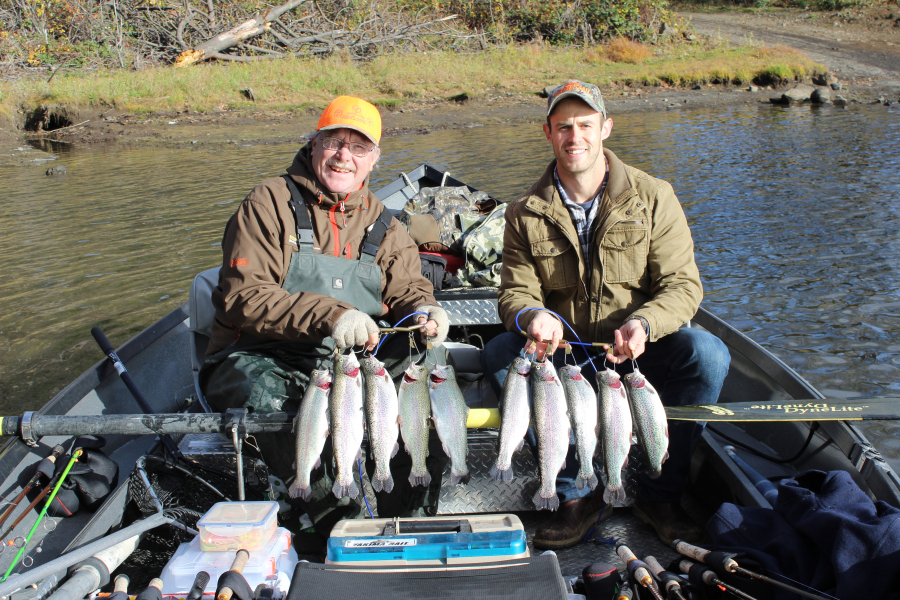 Terry Otto (left) and Wade Ramsey show off a nice catch of rainbow trout taken in Rowland Lake near Lyle, about 80 miles east of Vancouver. Most anglers at the lake did very well during the Black Friday statewide fall trout opener on Nov. 24.