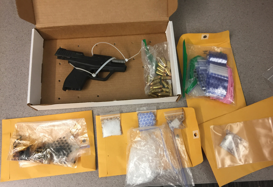 Heroin, methamphetamine and a semi-automatic handgun were recovered at an east Vancouver home early on Wednesday. Three people were arrested at the scene.