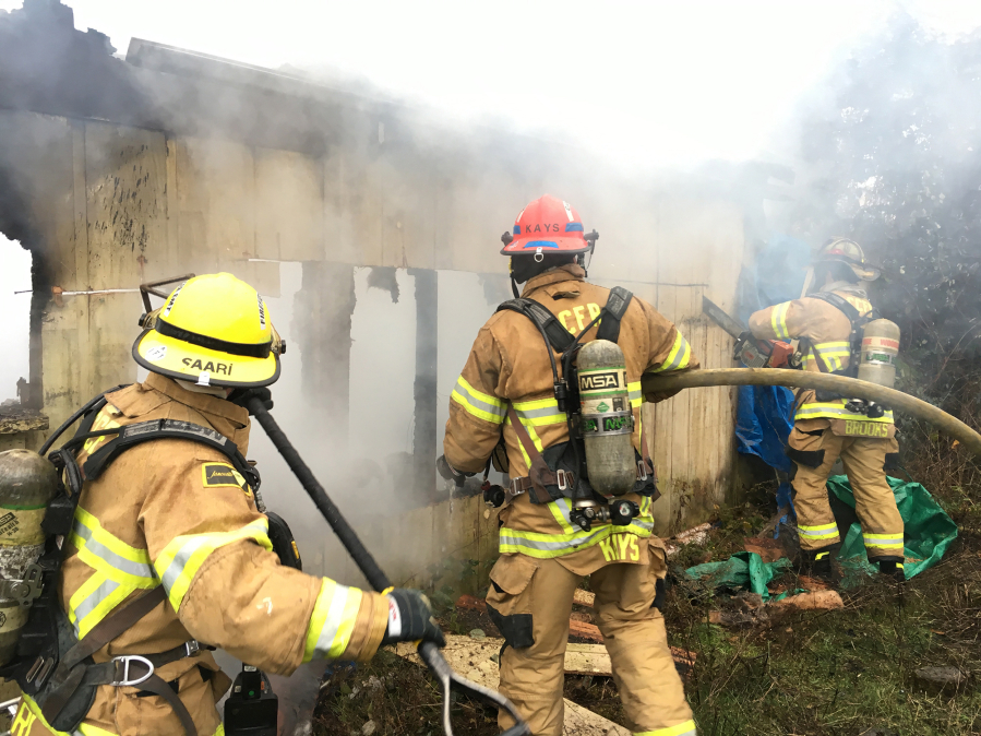 Firefighters prevented a shed fire from damaging nearby mobile homes Wednesday in Woodland.