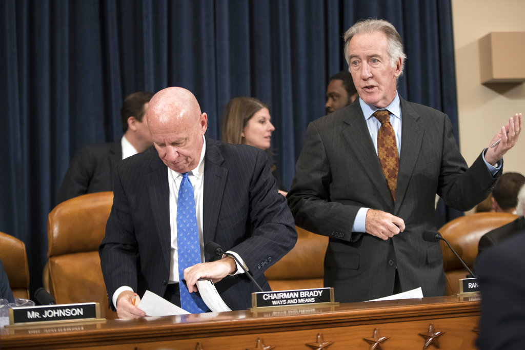 House Ways and Means Committee Chairman Kevin Brady, R-Texas, left, calls for a short recess to consider his manager's amendment, to the objections of Rep. Richard Neal, D-Mass., right, the ranking member, as the GOP tax bill debate enters a final day, on Capitol Hill in Washington, Thursday, Nov. 9, 2017. (AP Photo/J.