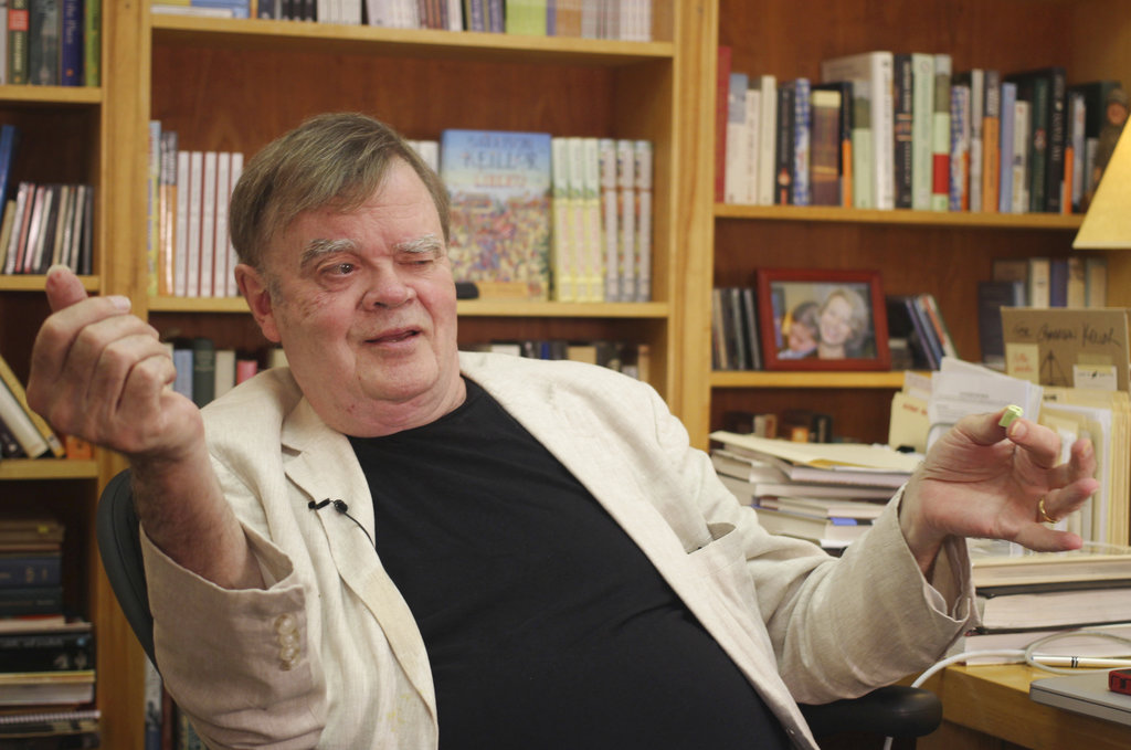 FILE - In this July 26, 2017 file photo, Garrison Keillor, creator and former host of, "A Prairie Home Companion," talks at his St. Paul, Minn., office. Keillor said Wednesday, Nov. 29, he's been fired by Minnesota Public Radio over allegations of improper behavior.