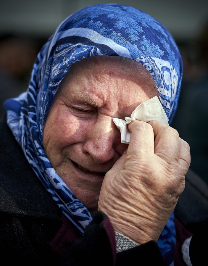 Nura Mustafic, one of the Mothers of Srebrenica and other Bosnian organizations, wipes away tears as she reacts to the verdict which the Yugoslav War Crimes Tribunal, ICTY, handed down in the genocide trial against former Bosnian Serb military chief Ratko Mladic, in The Hague, Netherlands, Wednesday Nov. 22, 2017. A U.N. court has convicted former Bosnian Serb military chief Gen. Ratko Mladic of genocide and crimes against humanity and sentenced him to life in prison for atrocities perpetrated during Bosnia’s 1992-1995 war.