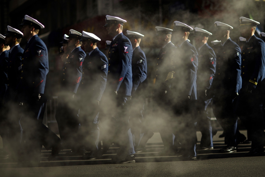 U.S. Navy personnel march in the annual Veterans Day parade in New York, Saturday.