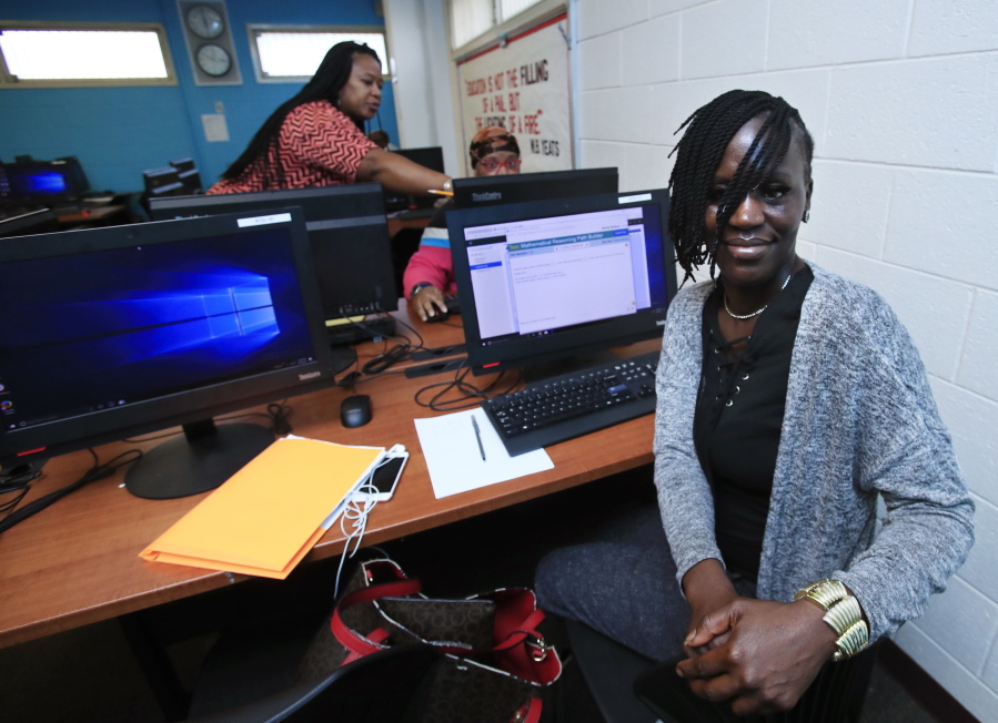 Nicole Dickey, 39, an adult learner at Community College Preparatory Academy in southeast Washington, poses for a picture in the computer laboratory.