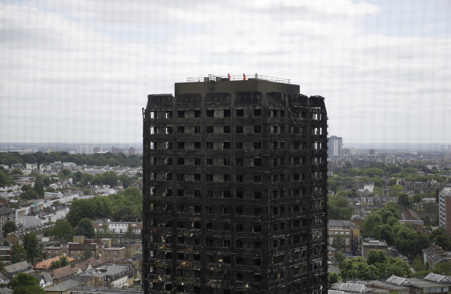 The fire-gutted Grenfell Tower is shown in London on June 16. Police say the final death toll in the high-rise fire is 71.