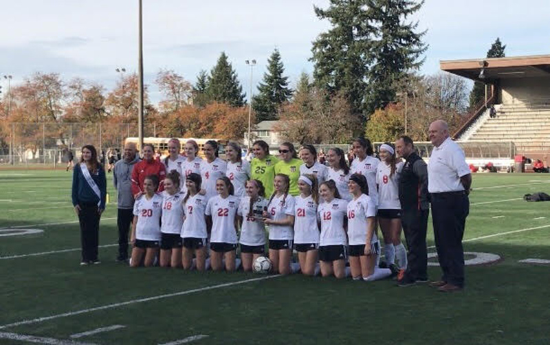 The Camas girls soccer team poses with the third-place trophy they won on Saturday, Nov. 18, 2017, after a 2-1 victory over Kennedy Catholic at the WIAA state tournament.