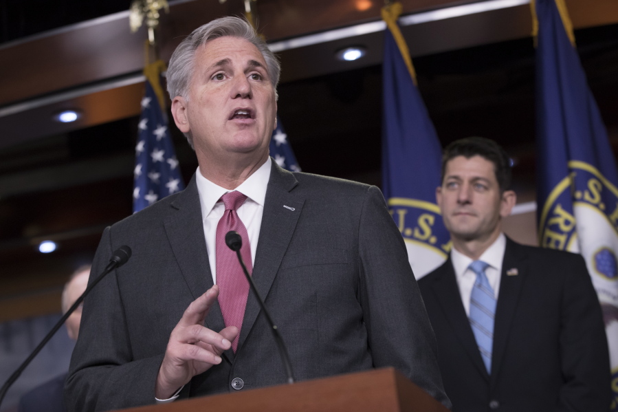 Majority Leader Kevin McCarthy, R-Calif., joined by Speaker of the House Paul Ryan, R-Wis., touts the GOP tax reform plan being crafted in the Ways and Means Committee this week, wuring a news conference on Capitol Hill in Washington, Tuesday, Nov. 7, 2017. (AP Photo/J.