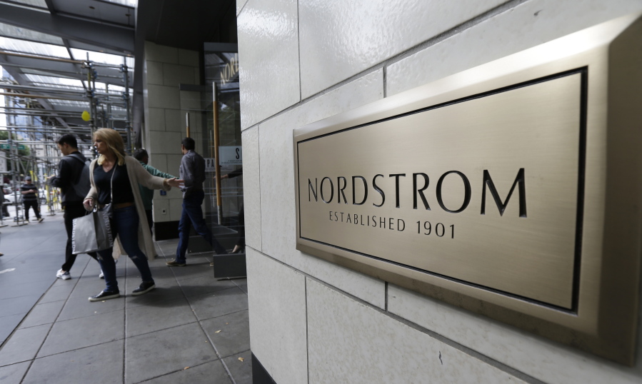 Shoppers come and go from Nordstrom Inc.’s flagship store in downtown Seattle. Ted S.