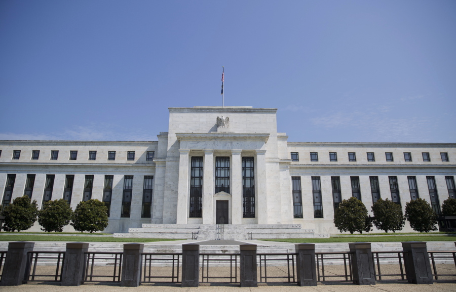 This Wednesday, Aug. 2, 2017, photo shows the Federal Reserve Building on Constitution Avenue in Washington. The Federal Reserve has begun the slow process of paring back its $4.5 trillion bond portfolio, and the stock market’s reaction has been barely a yawn. A lot is riding on whether markets can continue to remain calm.