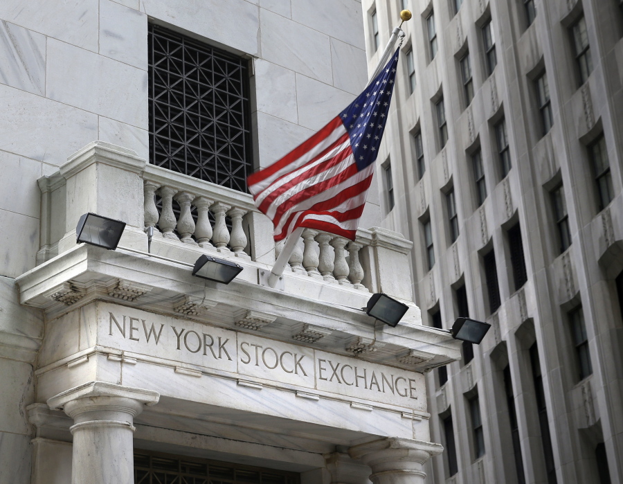 FILE - This Monday, Aug. 24, 2015, file photo shows the New York Stock Exchange. U.S. stocks are opening slightly higher, Monday, Nov.