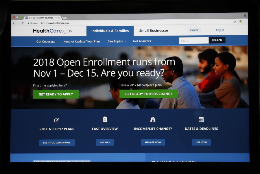 The Healthcare.gov website is seen on a computer screen Wednesday in Washington. The government says more than 600,000 people signed up for Affordable Care Act coverage in the first week of open enrollment season, and nearly 8 in 10 of those were current customers renewing their coverage.
