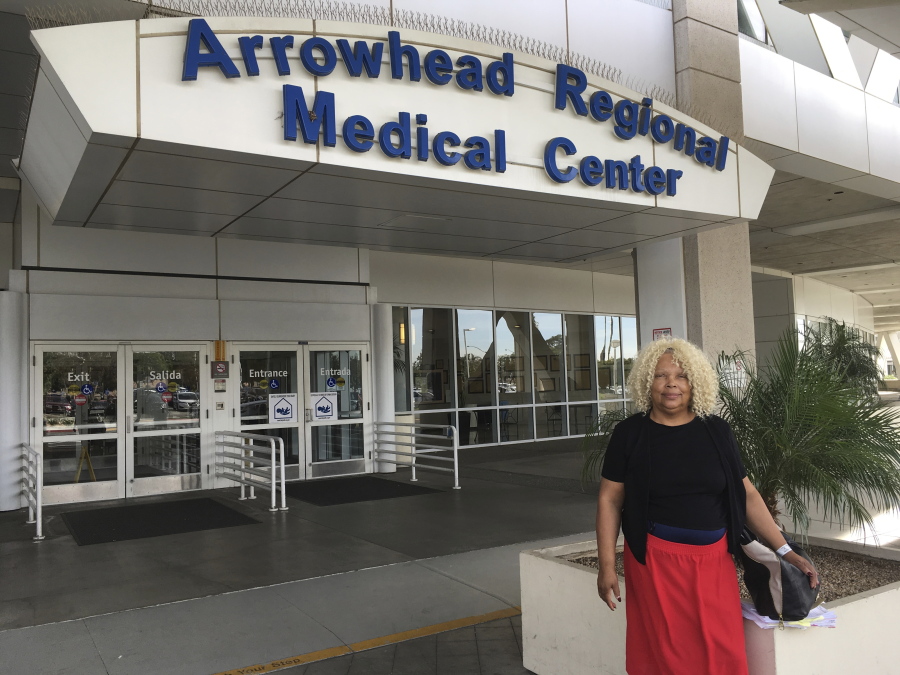 Attorney Carrye Washington stands in front of the Arrowhead Regional Medical Center in Colton, Calif. where her client Saliou Ndiaye remains on life support. Washington wants the U.S. government to take her client, asylum-seeker Saliou Ndiaye, back into custody and oversee his medical care. Authorities freed Nadiaye, from Senegal, who is at the center after a reported suicide attempt.