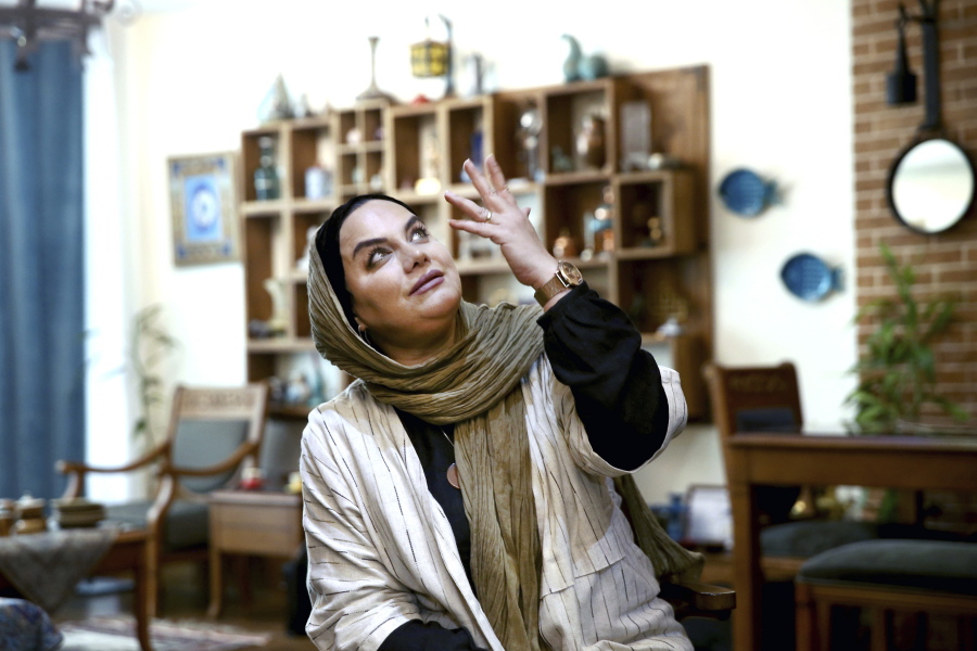 Iranian director Narges Abyar gestures during an interview last month at her home in Tehran, Iran. Her film is Iran’s first-ever nominee for the Academy Awards’ best foreign film prize that was directed by a woman.