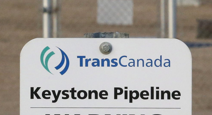 FILE- This Nov. 6, 2015, file photo shows a sign for TransCanada’s Keystone pipeline facilities in Hardisty, Alberta, Canada. TransCanada Corp.’s Keystone pipeline leaked oil onto agricultural land in northeastern South Dakota, the company and state regulators said Thursday, Nov. 16, 2017, but state officials don’t believe the leak polluted any surface water bodies or drinking water systems.