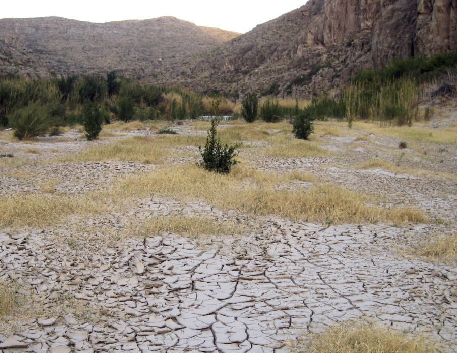 Dry cracked mud along the banks of the Rio Grande at Big Bend National Park in Texas during one of the strongest La Nina years on record. The National Oceanic and Atmospheric Administration said Thursday, Nov. 9, 2017 that a weak La Nina has formed and is expected to stick around for several months.
