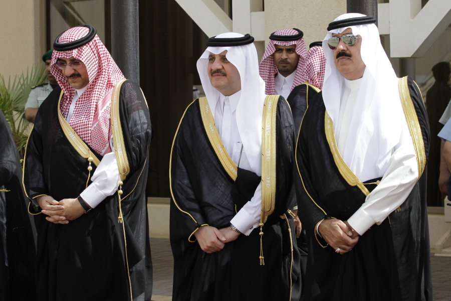 Saudi Arabia’s Interior Minister Prince Mohammed bin Nayef, left, his older brother Saud bin Nayef, center, Prince Miteb bin Abdullah, son of Saudi King Abdullah bin Abdul Aziz al-Saud wait for Gulf Arab leaders ahead of the opening of Gulf Cooperation Council, also known as GCC summit, in Riyadh, Saudi Arabia. Lebanon-based businessmen and a media mogul who lost businesses in Saudi Arabia or through dealings with members of the royal family are closely watching a new campaign led by the powerful crown prince targeting officials, princes and tycoons in the oil-rich kingdom to see whether it will help them win back what they lost over the years.