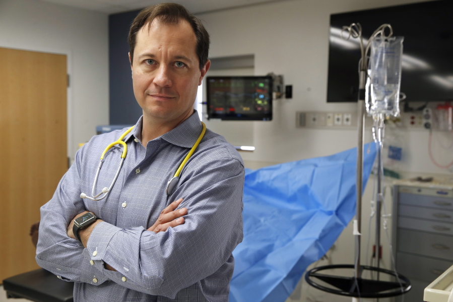 Dr. Jesse Pines poses for a portrait at the George Washington University School of Medicine & Health Sciences Clinical Learning and Simulation Skills Center in Washington. Pines teaches emergency medicine at the school and also does a rotation in the hospital’s emergency room. A push by the insurer Anthem to limit ER visits to true emergencies worries doctors and patients who question whether they will make the right call or get stuck with a bill. “I think it’s completely unfair to patients,” said Pines.