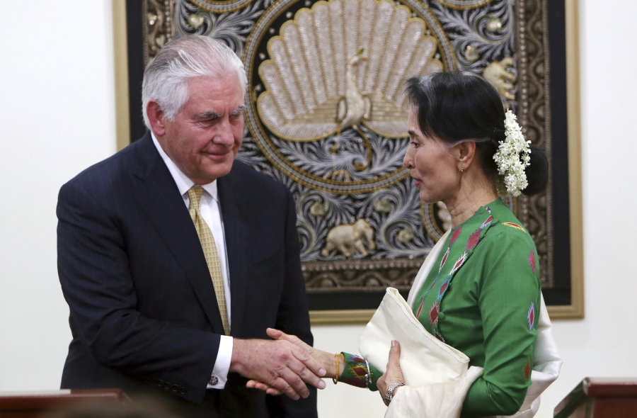 Myanmar’s leader Aung San Suu Kyi, right, shakes hands with visiting U.S. Secretary of State Rex Tillerson after their press conference at the Foreign Ministry office in Naypyitaw, Myanmar, on Wednesday.