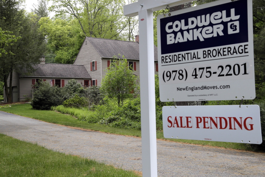 This Tuesday, May 24, 2016, photo shows a “Sale Pending” sign in front of a house in North Andover, Mass. On Wednesday, Nov. 29, 2017, the National Association of Realtors releases its October report on pending home sales, which are seen as a barometer of future purchases.