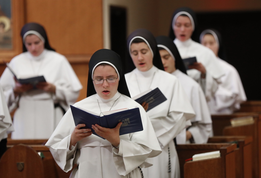 Sisters sing at the Dominican Sisters of Mary, Mother of the Eucharist campus in Ann Arbor, Mich.
