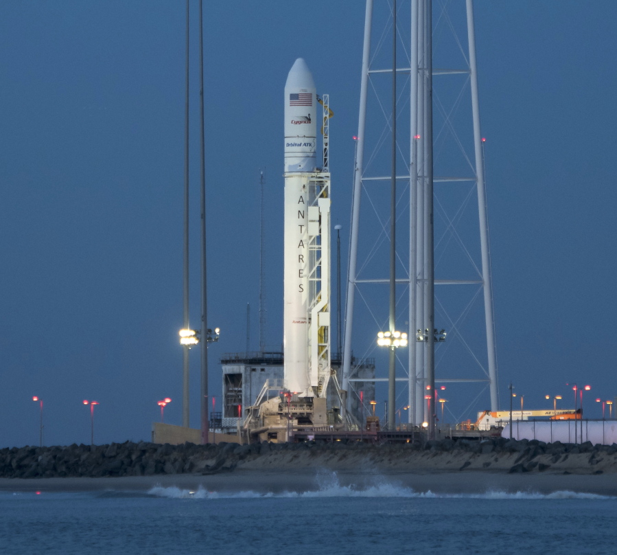 In this photo provided by NASA, the Orbital ATK Antares rocket, with the Cygnus spacecraft onboard, is seen on launch Pad-0A, Friday, Nov. 10, 2017 at NASA’s Wallops Flight Facility in Wallops Island, Va. Orbital ATK’s eighth contracted cargo resupply mission with NASA to the International Space Station will deliver approximately 7,400 pounds of science and research, crew supplies and vehicle hardware to the orbital laboratory and its crew.