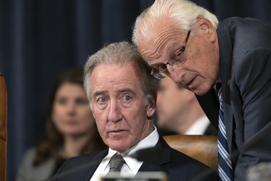 Rep. Richard Neal, D-Mass., left, the ranking member of the Ways and Means Committee, confers with Rep. Bill Pascrell, D-N.J., during the markup process of the GOP’s far-reaching tax overhaul, on Capitol Hill in Washington on Monday. (AP Photo/J.