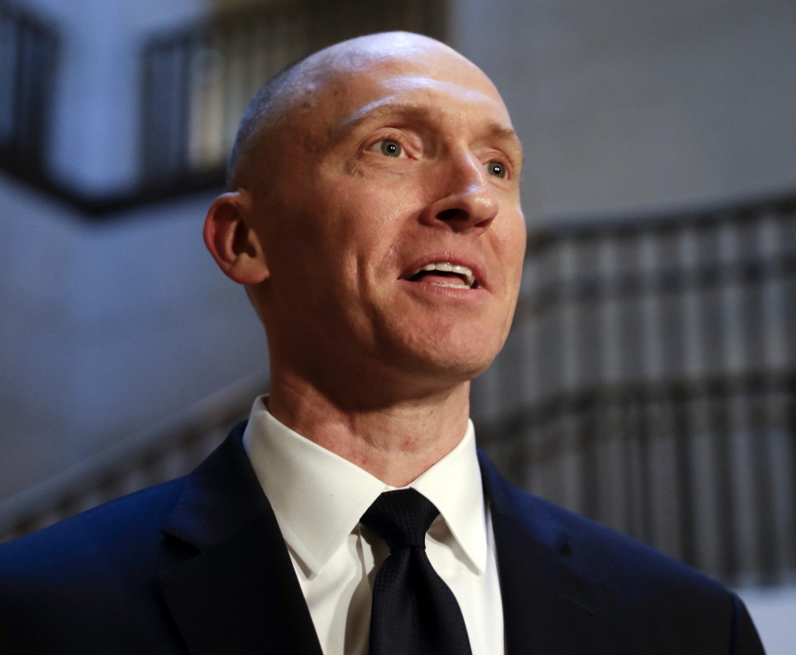Carter Page, a foreign policy adviser to Donald Trump’s 2016 presidential campaign, speaks with reporters following a day of questions from the House Intelligence Committee, on Capitol Hill in Washington. (AP Photo/J.