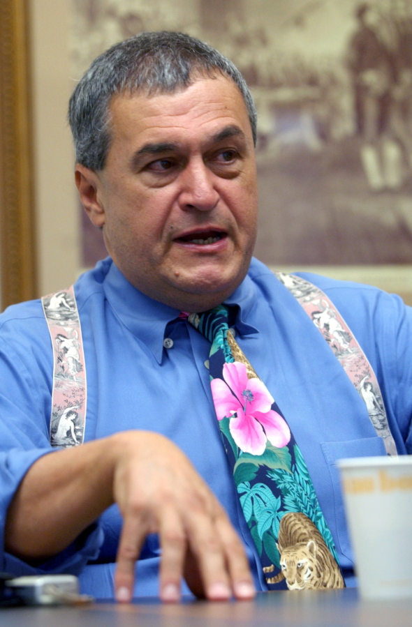 Tony Podesta, speaks to Associated Press reporters in Philadelphia. Three powerful Washington lobbying and legal firms, with Democratic as well as Republican ties, are finding themselves under an intense spotlight. The Podesta Group, founded by Washington powerbroker Tony Podesta, was among the three firms cited by pseudonym or other references in the indictment, though none is charged with crimes.