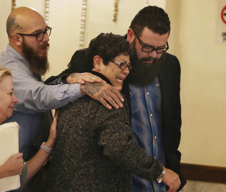 Christopher “Jake” Carrizal, right, leaves the McLennan County courtroom Friday in Waco, Texas, with his mother, Sonia, following a mistrial.