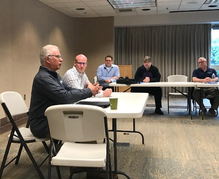 WIAA executive director Mike Colbrese (left) speaks to sports editors at the annual APSE meeting in Seattle in May. Colbrese announced Thursday he'll retire in 2019 after serving as the WIAA's executive director since 1993.