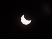 The moon eclipses the sun in a photo taken from the fifth-floor terrace of the Vancouver Community Library on Aug. 21.