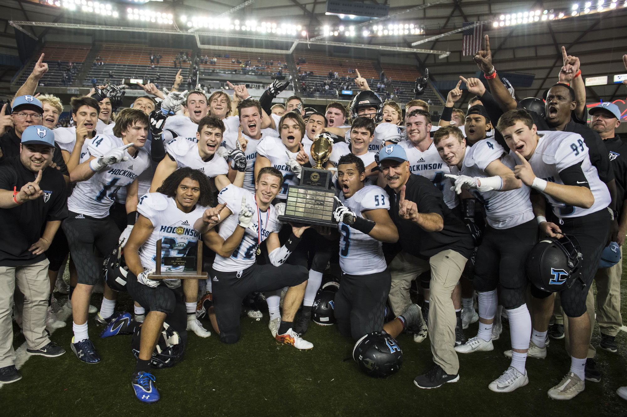 Hockinson celebrates their win against Tumwater after the 2A state football championship game Saturday, Dec. 2, 2017, in Tacoma, Wash.