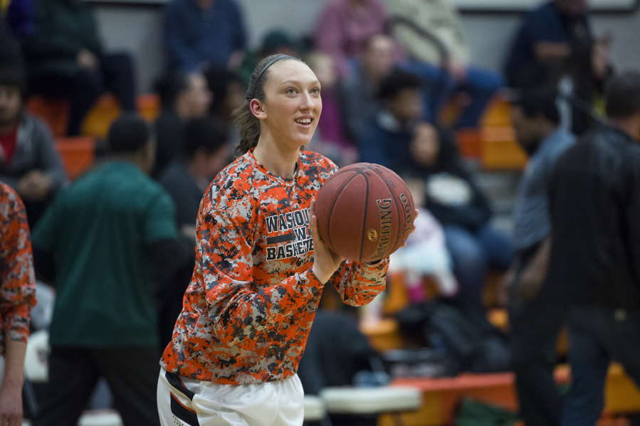 Washougal's Beyonce Bea warms up before the first game of the season against Evergreen High School at Washougal High School, Monday November 27, 2017.