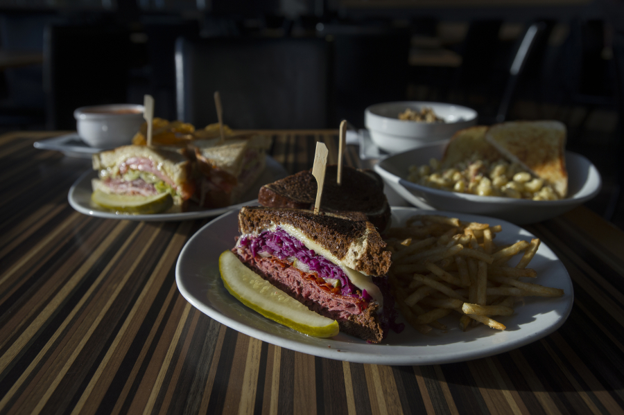 The Dilling, from left, with the Reuben and Mac ’n‘ Cheese at MEstro in east Vancouver.