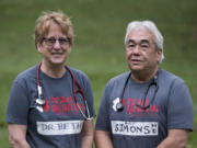 Dr. Beth Lee and her husband Dr. Art Simons stand outside their home in Battle Ground. The retired physicians recently returned from an eight-day trip volunteering for a medical relief effort in Puerto Rico organized by Team Rubicon.